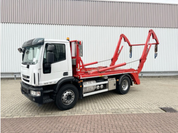 Skip loader truck