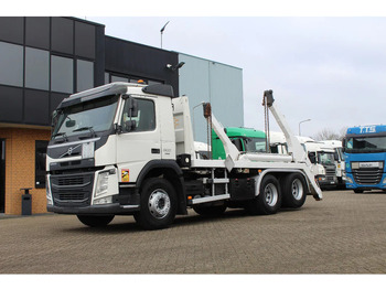 Skip loader truck VOLVO FM 500