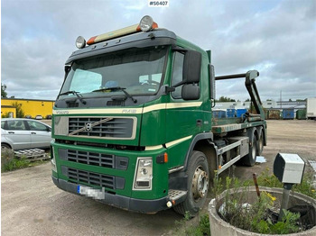 Skip loader truck VOLVO FM12