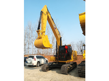 Crawler excavator CATERPILLAR 323